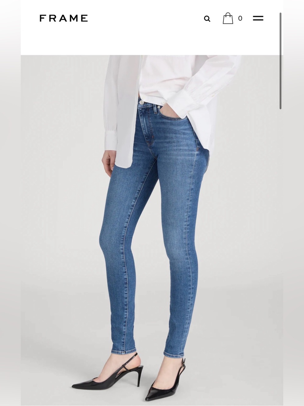 Frame Le High Skinny jeans in a medium wash blue color